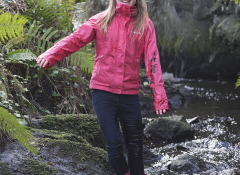 Molly stands in a stream